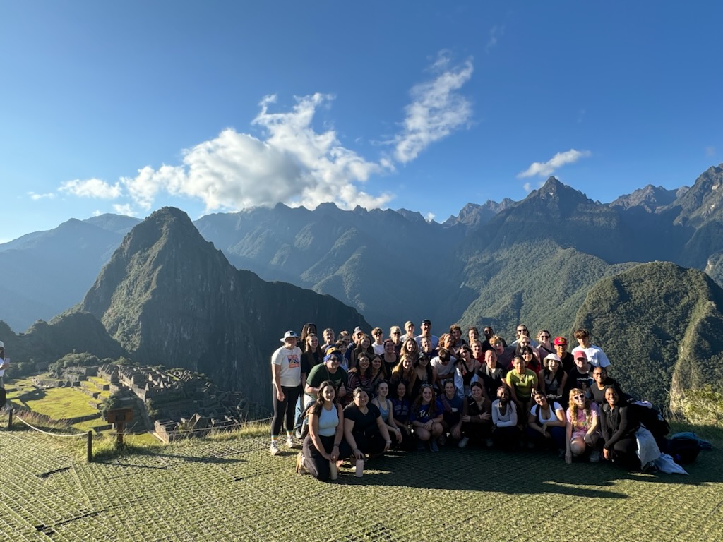 Central Students pose in front of Machu Picchu for a group photo