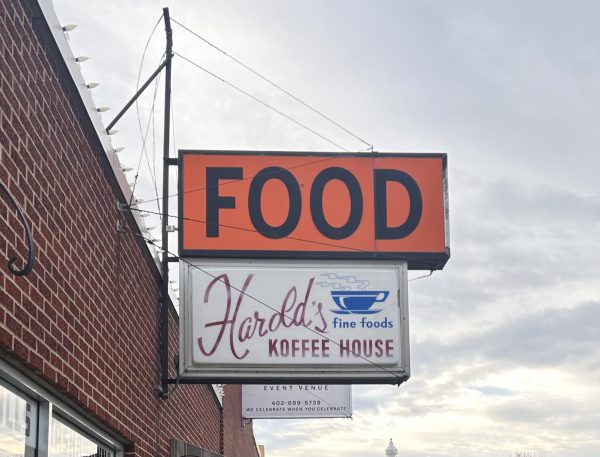 Infamous Herolds Koffee House sign hanging on N 30th St